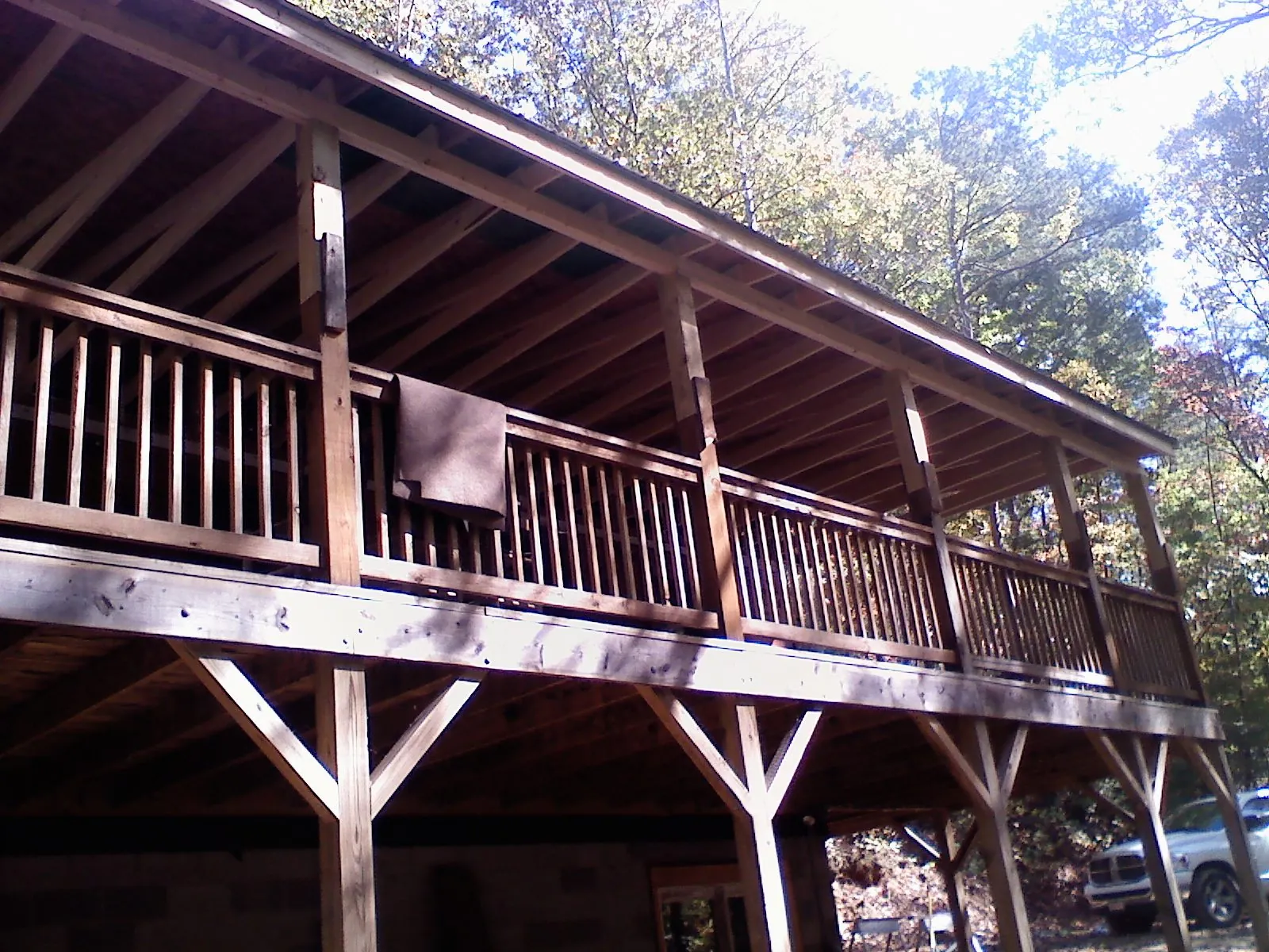Timber framing under a new elevated porch and deck — Roof Leak Repair in Keyes by Roofing Brothers